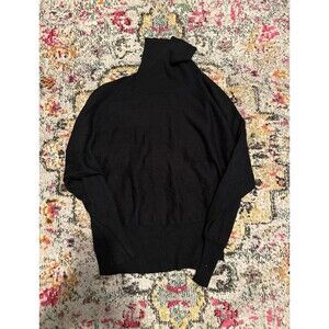 Carolyn Taylor black turtleneck sweater